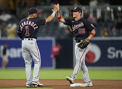 Aug 19, 2022; San Diego, California, USA;  Washington Nationals right fielder Alex Call (62) greets second baseman Cesar Hernandez (1) after the game against the San Diego Padres at Petco Park. Mandatory Credit: Ray Acevedo-USA TODAY Sports