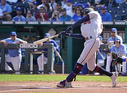 Oct 3, 2021; Kansas City, Missouri, USA; Minnesota Twins center fielder Byron Buxton (25) hits a single against the Kansas City Royals in the first inning at Kauffman Stadium. Mandatory Credit: Denny Medley-USA TODAY Sports