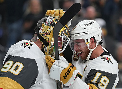 Oct 29, 2021; Las Vegas, Nevada, USA; Vegas Golden Knights right wing Reilly Smith (19) congratulates Vegas Golden Knights goaltender Robin Lehner (90) after the Golden Knights defeated the Anaheim Ducks 5-4 in a shootout at T-Mobile Arena. Mandatory Credit: Stephen R. Sylvanie-USA TODAY Sports