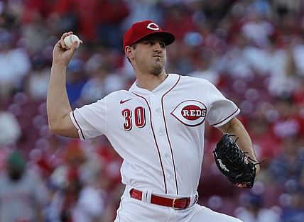 Jun 21, 2022; Cincinnati, Ohio, USA; Cincinnati Reds starting pitcher Tyler Mahle (30) throws a pitch against the Los Angeles Dodgers during the first inning at Great American Ball Park. Mandatory Credit: David Kohl-USA TODAY Sports