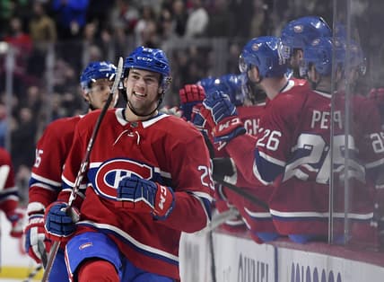 Jan 13, 2020; Montreal, Quebec, CAN; Montreal Canadiens forward Ryan Poehling (25) reacts with teammates after scoring a goal against the Calgary Flames during the third period at the Bell Centre. Mandatory Credit: Eric Bolte-USA TODAY Sports