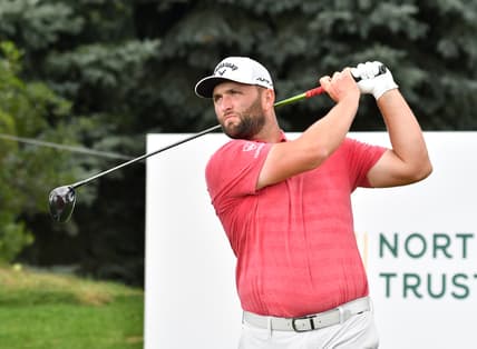 Aug 23, 2021; Jersey City, New Jersey, USA; Jon Rahm watches his tee shot on the ninth hole during the final round of The Northern Trust golf tournament at the Liberty National Golf Club. Mandatory Credit: Mark Konezny-USA TODAY Sports