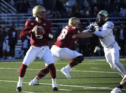 Nov 27, 2021; Chestnut Hill, Massachusetts, USA;  Boston College Eagles quarterback Phil Jurkovec (5) looks for an open receiver during the second half against the Wake Forest Demon Deacons at Alumni Stadium. Mandatory Credit: Bob DeChiara-USA TODAY Sports