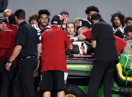 Sep 17, 2022; Raleigh, North Carolina, USA; Texas Tech Red Raiders linebacker Bryce Ramirez (54) is carted off the field after suffering an apparent injury during the first half against the North Carolina State Wolfpack at Carter-Finley Stadium. Mandatory Credit: Rob Kinnan-USA TODAY Sports