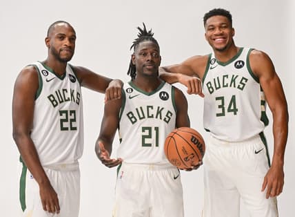 Sep 25, 2022; Milwaukee, WI, USA;  Milwaukee Bucks forward Khris Middleton (22), guard Jrue Holiday (21) and forward Giannis Antetokounmpo (34) pose for a picture during media day at the Fiserv Forum.Mandatory Credit: Benny Sieu-USA TODAY Sports