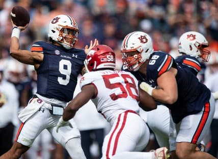 Auburn Tigers quarterback Robby Ashford (9) throws the ball as the Auburn Tigers take on Arkansas Razorbacks at Jordan-Hare Stadium in Auburn, Ala., on Saturday, Oct. 29, 2022. Arkansas Razorbacks defeated Auburn Tigers 41-27.