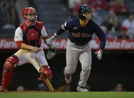 May 22, 2023; Anaheim, California, USA;  Boston Red Sox left fielder Masataka Yoshida (7) singles in a run in the sixth inning against the Los Angeles Angels at Angel Stadium. Mandatory Credit: Jayne Kamin-Oncea-USA TODAY Sports