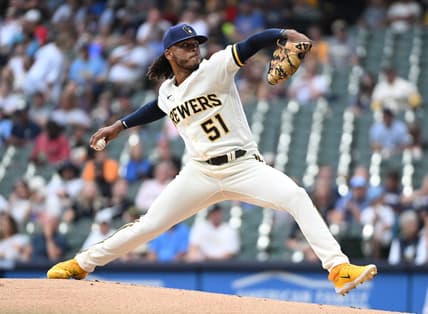 Aug 7, 2023; Milwaukee, Wisconsin, USA; Milwaukee Brewers starting pitcher Freddy Peralta (51) delivers a pitch against the Colorado Rockies in the first inning at American Family Field. Mandatory Credit: Michael McLoone-USA TODAY Sports