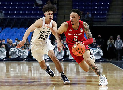 Feb 27, 2022; University Park, Pennsylvania, USA; Nebraska Cornhuskers guard Trey McGowens (2) dribbles the ball around the outside of Penn State Nittany Lions guard Dallion Johnson (23) during the second half at Bryce Jordan Center. Nebraska defeated Penn State 93-70. Mandatory Credit: Matthew OHaren-USA TODAY Sports