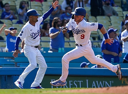 May 29, 2021; Los Angeles, California, USA; Los Angeles Dodgers second baseman Gavin Lux (9) rounds third base and goes on to score on a double by Justin Turner (not pictured) in the first inning against the San Francisco Giants at Dodger Stadium. Mandatory Credit: Robert Hanashiro-USA TODAY Sports