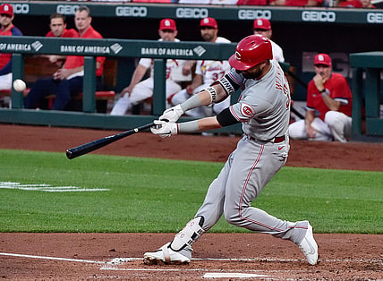 Jun 3, 2021; St. Louis, Missouri, USA;  Cincinnati Reds left fielder Jesse Winker (33) hits a two run home run during the second inning against the St. Louis Cardinals at Busch Stadium. Mandatory Credit: Jeff Curry-USA TODAY Sports