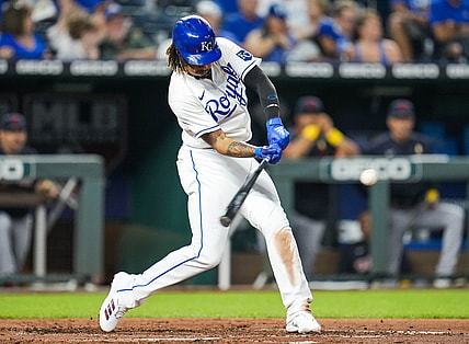 Sep 1, 2021; Kansas City, Missouri, USA; Kansas City Royals designated hitter Adalberto Mondesi (27) hits a home run against the Cleveland Indians during the fourth inning at Kauffman Stadium. Mandatory Credit: Jay Biggerstaff-USA TODAY Sports
