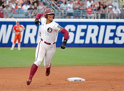 Florida State.'s Michaela Edenfield (51) celebrates a home run in the first inning during a softball game between Oklahoma State Cowgirls and Florida State in the Women's College World Series at USA Softball Hall of Fame Stadium in  in Oklahoma City, Thursday, June, 1, 2023.