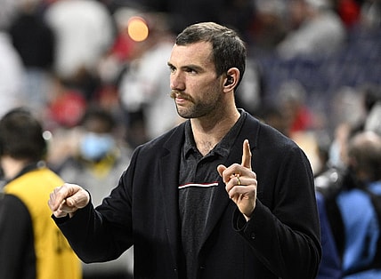 Jan 10, 2022; Indianapolis, IN, USA; Andrew Luck on hte field before the 2022 CFP college football national championship game between the Alabama Crimson Tide and the Georgia Bulldogs at Lucas Oil Stadium. Mandatory Credit: Marc Lebryk-USA TODAY Sports