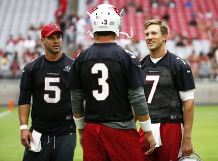 Cardinals quarterbacks Carson Palmer and Blaine Gabbert