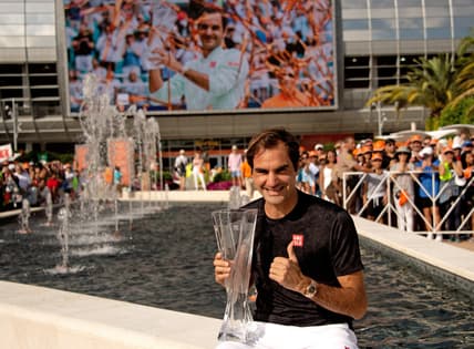 Mar 31, 2019; Miami Gardens, FL, USA; Roger Federer of Switzerland poses with the winning trophy after defeating John Isner of the United States (not pictured) during the men   s finals at the Miami Open at Miami Open Tennis Complex. Mandatory Credit: Steve Mitchell-USA TODAY Sports