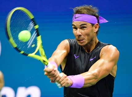 Aug 27, 2019; Flushing, NY, USA; Rafael Nadal of Spain hits to John Millman of Australia in the first round on day two of the 2019 U.S. Open tennis tournament at USTA Billie Jean King National Tennis Center. Mandatory Credit: Robert Deutsch-USA TODAY Sports