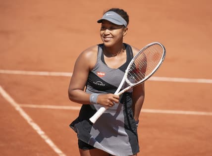 May 30, 2021; Paris, France; Naomi Osaka (JPN) reacts during her match against Patricia Maria Tig (ROU) at Roland Garros Stadium. Mandatory Credit: Susan Mullane-USA TODAY Sports