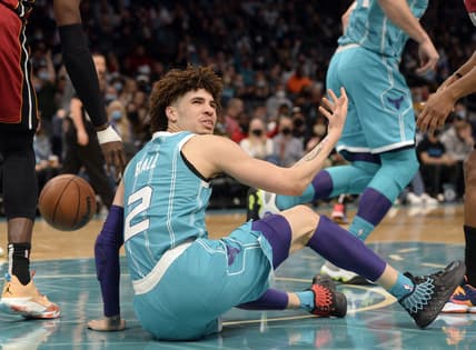 Feb 5, 2022; Charlotte, North Carolina, USA;  Charlotte Hornets guard LaMelo Ball (2) reacts after being fouled against the Miami Heat during the second half at the Spectrum Center. Mandatory Credit: Sam Sharpe-USA TODAY Sports