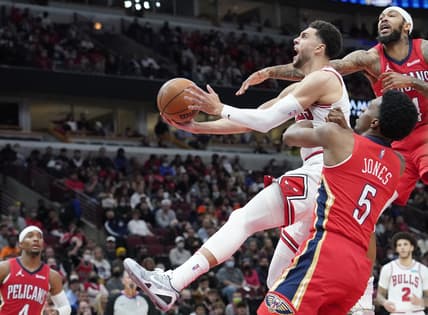Oct 22, 2021; Chicago, Illinois, USA; Chicago Bulls guard Zach LaVine (8) is defended by New Orleans Pelicans forward Herbert Jones (5) during the second half at United Center. Mandatory Credit: David Banks-USA TODAY Sports