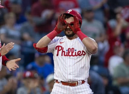 Jun 9, 2023; Philadelphia, Pennsylvania, USA; Philadelphia Phillies left fielder Kyle Schwarber (12) reacts after hitting a triple during the third inning against the Los Angeles Dodgers at Citizens Bank Park. Mandatory Credit: Bill Streicher-USA TODAY Sports