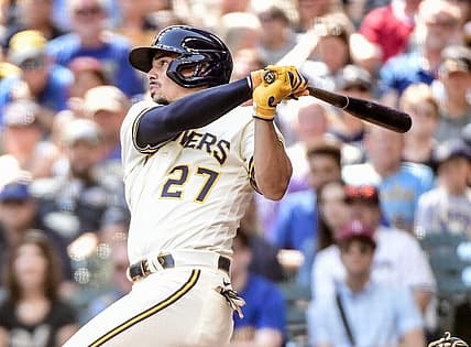 Aug 31, 2022; Milwaukee, Wisconsin, USA;  Milwaukee Brewers shortstop Willy Adames (27) hits an RBI double in the fifth inning against the Pittsburgh Pirates at American Family Field. Mandatory Credit: Benny Sieu-USA TODAY Sports