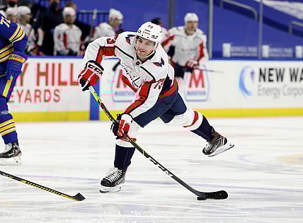 Apr 9, 2021; Buffalo, New York, USA; Washington Capitals left wing Conor Sheary (73) takes a shot on goal during the third period against the Buffalo Sabres at KeyBank Center. Mandatory Credit: Timothy T. Ludwig-USA TODAY Sports
