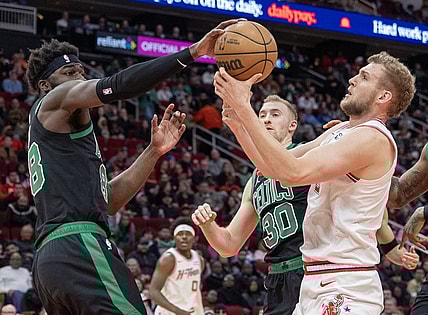 Jan 21, 2024; Houston, Texas, USA;  Boston Celtics center Neemias Queta (88) and Houston Rockets center Jock Landale (2) fight over a rebound in the second quarter at Toyota Center. Mandatory Credit: Thomas Shea-USA TODAY Sports