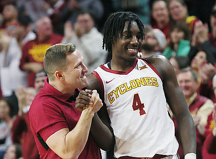 Iowa State Cyclones men's basketball head coach T. J. Otzelberger congratulates Iowa State Cyclones guard Demarion Watson (4) after winning 58-45 over Oklahoma Sooners in the Big-12 conference showdown at Hilton Coliseum on Wednesday, Feb. 28, 2024, in Ames, Iowa.