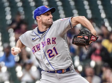 Sep 19, 2022; Milwaukee, Wisconsin, USA; New York Mets pitcher Max Scherzer (21) throws a pitch in the first inning against the Milwaukee Brewers at American Family Field. Mandatory Credit: Benny Sieu-USA TODAY Sports
