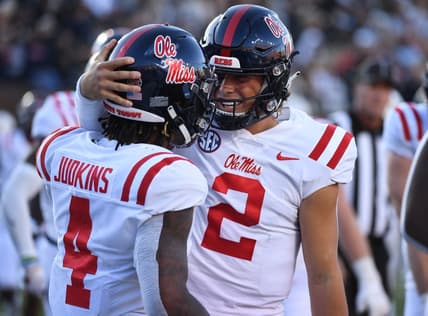 Oct 8, 2022; Nashville, Tennessee, USA; Mississippi Rebels running back Quinshon Judkins (4) celebrates with quarterback Jaxson Dart (2) after scoring against the Vanderbilt Commodores during the second half at FirstBank Stadium. Mandatory Credit: Christopher Hanewinckel-USA TODAY Sports