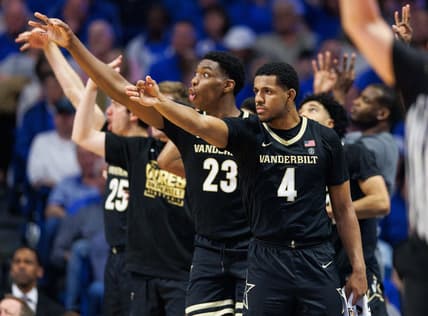 Mar 1, 2023; Lexington, Kentucky, USA; Vanderbilt Commodores guard Jordan Wright (4) celebrates from the bench during the second half against the Kentucky Wildcats at Rupp Arena at Central Bank Center. Mandatory Credit: Jordan Prather-USA TODAY Sports