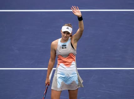 Elena Rybakina of Kazakhstan waves to fans after defeating Aryna Sabalenka of Belarus in the women's singles final of the BNP Paribas Open at the Indian Wells Tennis Garden in Indian Wells, Calif., Sunday, March 19, 2023.