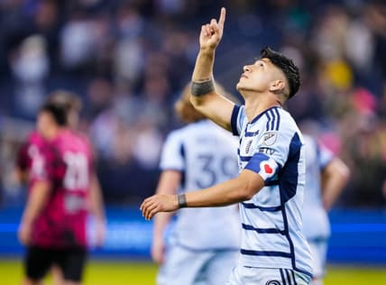 Apr 25, 2023; Kansas City, KS, USA; Sporting Kansas City forward Alan Pulido (9) celebrates after scoring a goal during the second half against Tulsa Athletic at Children's Mercy Park. Mandatory Credit: Jay Biggerstaff-USA TODAY Sports