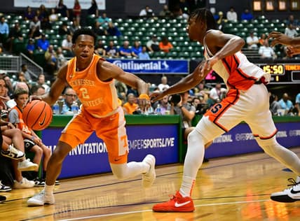 Nov 20, 2023; Honolulu, Hawaii, USA;  Tennessee Volunteers guard Jordan Gainey (2) drives the ball around Syracuse Orange guard JJ Starling (2) during the first period at SimpliFi Arena at Stan Sheriff Center. Mandatory Credit: Steven Erler-USA TODAY Sports