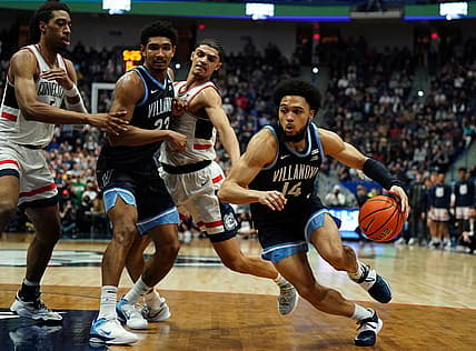 Feb 22, 2022; Hartford, Connecticut, USA; Villanova Wildcats guard Caleb Daniels (14) drives the ball against the Connecticut Huskies in the second half at XL Center. Mandatory Credit: David Butler II-USA TODAY Sports