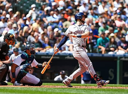 Jul 23, 2022; Seattle, Washington, USA;  Houston Astros right fielder Kyle Tucker (30) follows through on an RBI double against the Seattle Mariners during the fourth inning at T-Mobile Park. Mandatory Credit: Lindsey Wasson-USA TODAY Sports