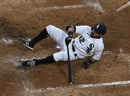 Apr 24, 2021; Chicago, Illinois, USA;  Chicago White Sox right fielder Adam Eaton (12) is nearly hit by a pitch thrown by Texas Rangers starting pitcher Kyle Gibson (44) in thethird t inning at Guaranteed Rate Field. Mandatory Credit: Matt Marton-USA TODAY Sports