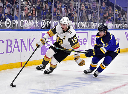 Apr 7, 2021; St. Louis, Missouri, USA;  Vegas Golden Knights right wing Reilly Smith (19) handles the puck as St. Louis Blues defenseman Torey Krug (47) defends during the third period at Enterprise Center. Mandatory Credit: Jeff Curry-USA TODAY Sports