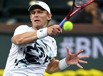 Oct 12, 2021; Indian Wells, CA, USA; Kevin Anderson (RSA) hits a shot against Gael Monfils (FRA) during a third round match in the BNP Paribas Open at the Indian Wells Tennis Garden. Mandatory Credit: Jayne Kamin-Oncea-USA TODAY Sports