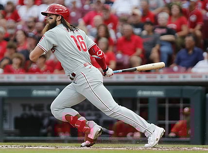 Aug 15, 2022; Cincinnati, Ohio, USA; Philadelphia Phillies center fielder Brandon Marsh (16) hits a single against the Cincinnati Reds during the second inning at Great American Ball Park. Mandatory Credit: David Kohl-USA TODAY Sports