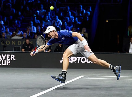 Sep 23, 2022; London, United Kingdom;  Andy Murray (GBR) plays a shot against Alex De Minaur (AUS) in his Laver Cup tennis match.  Mandatory Credit: Peter van den Berg-USA TODAY Sports