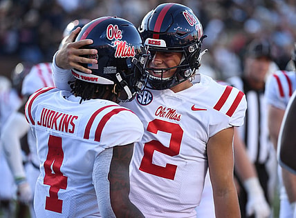 Oct 8, 2022; Nashville, Tennessee, USA; Mississippi Rebels running back Quinshon Judkins (4) celebrates with quarterback Jaxson Dart (2) after scoring against the Vanderbilt Commodores during the second half at FirstBank Stadium. Mandatory Credit: Christopher Hanewinckel-USA TODAY Sports