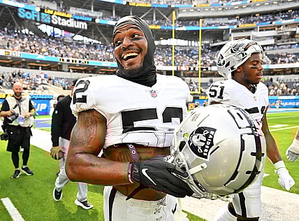 Sep 11, 2022; Inglewood, California, USA;  Las Vegas Raiders linebacker Denzel Perryman (52) warms up before the game against the Los Angeles Chargers at SoFi Stadium. Mandatory Credit: Jayne Kamin-Oncea-USA TODAY Sports