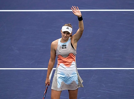 Elena Rybakina of Kazakhstan waves to fans after defeating Aryna Sabalenka of Belarus in the women's singles final of the BNP Paribas Open at the Indian Wells Tennis Garden in Indian Wells, Calif., Sunday, March 19, 2023.