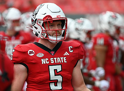 Sep 9, 2023; Raleigh, North Carolina, USA;  North Carolina State Wolfpack quarterback Brennan Armstrong (5) warms up prior to a game against the Notre Dame Fighting Irish at Carter-Finley Stadium. Mandatory Credit: Rob Kinnan-USA TODAY Sports