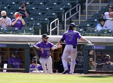 Mar 9, 2021; Scottsdale, Arizona, USA; Colorado Rockies manager Bud Black reacts after Brendan Rodgers (7) scored on a Dom Nu ez RBI-single against the Arizona Diamondbacks in the fourth inning during a spring training game at Salt River Fields at Talking Stick. Mandatory Credit: Rob Schumacher-Arizona Republic