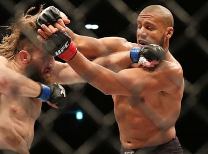 Dec 21, 2019; Busan, SOUTH KOREA; Ciryl Gane (red gloves) fights Tanner Boser (blue gloves) during UFC Fight Night at Sajik Arena. Mandatory Credit: Jasmin Frank-USA TODAY Sports