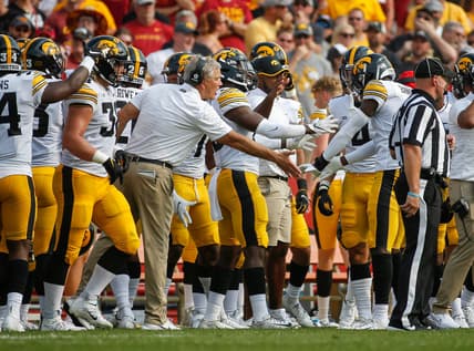 Iowa head football coach Kirk Ferentz celebrates with senior defensive back Matt Hankins after Hankins intercepted a pass from Iowa State senior quarterback Brock Purdy in the second quarter at Jack Trice Stadium in Ames on Saturday, Sept. 11, 2021.

20210911 Cyhawk