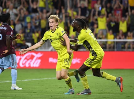 Aug 31, 2022; Nashville, Tennessee, USA; Nashville SC midfielder Jacob Shaffelburg (14) celebrates after scoring during the second half against the Colorado Rapids at Geodis Park. Mandatory Credit: Christopher Hanewinckel-USA TODAY Sports